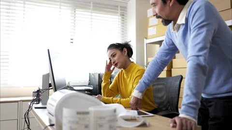 Small business team checking inventory together in warehouse Stock Footage 326271843