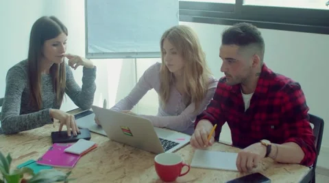 Small business team working in the startup office Stock Footage 62948986