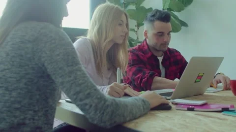Small business team working in the startup office Stock Footage 62948991