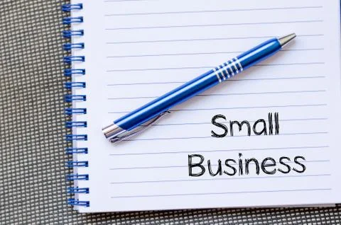 Small business text concept on notebook Stock Photos
