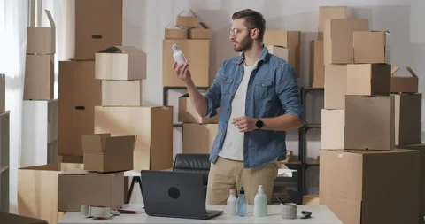 Small business two men work at a warehouse of household chemicals. Stock Footage 149472048