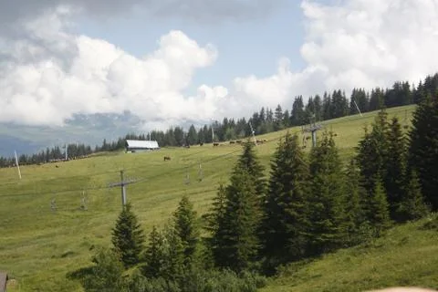 Small cabin behind the assembly ski lifts Stock Photos
