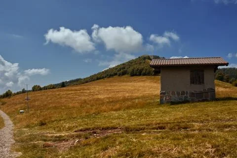 A small cabin in the mountains. Stock Photos