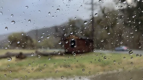 Small cabin on the side of the road Stock Footage 126082239