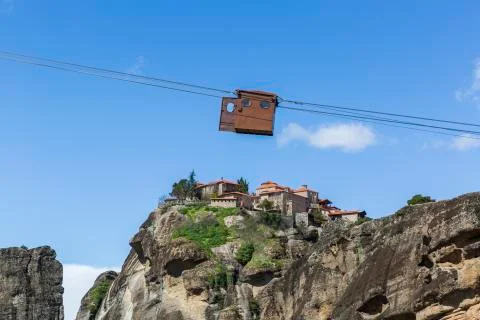 A small cable car used by priests who visit Meteora, Greece Stock Photos