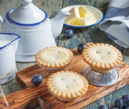 Small cakes with berries Stock Photos