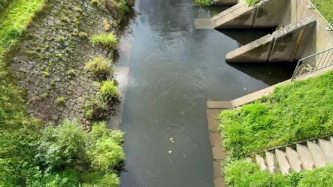 Small Canal Flowing Through Concrete Water Channel Stock Footage 320831399