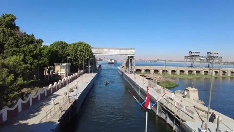 Small canal water lock system on the Nile - Time Lapse Video stock 229684486