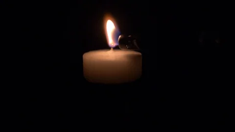 Small candle being lit in slow motion Stock-Footage 87319224