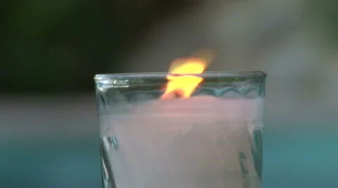A small candle burning Stock Footage 574405