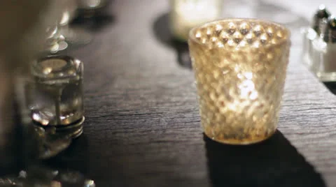 Small Candle On Table Stock Footage 22854896