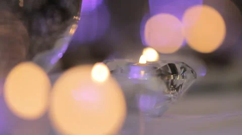 Small candles and colored light patches Stock Footage 62378946