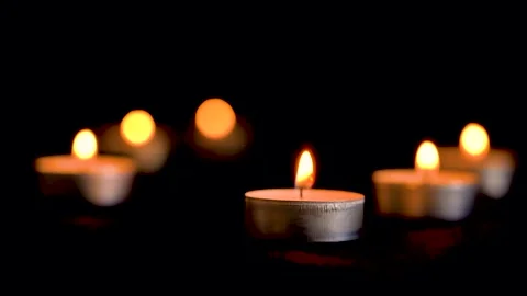 Small candles. Close-up shot. Lots of candles with shallow depth. Decorative Stock Footage 143059873