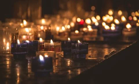 Small candles in the dark Stock Photos