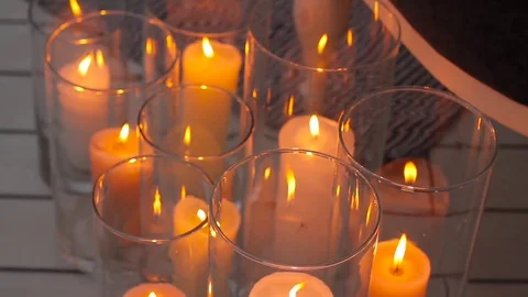Small candles lightning close up Stock Footage 74457906