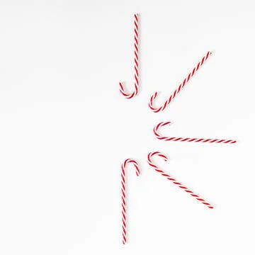 Small candy canes white table. High quality and resolution beautiful photo Stock Photos