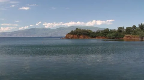 Small cape in a calm bay Stock Footage 40353377