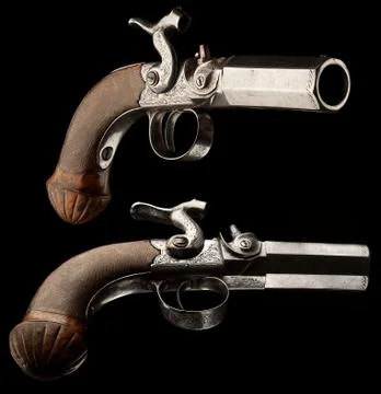Small capsule pistol. Stock Photos