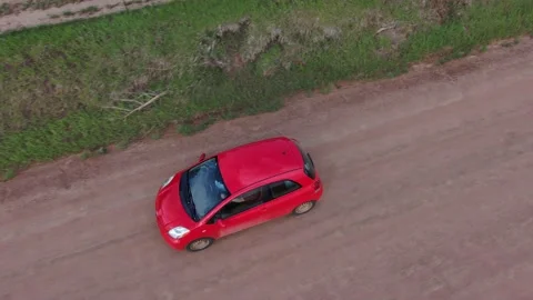 Small car on county road Stock Footage 154522776
