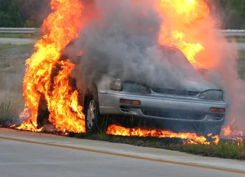 Small Car Engulfed In Flames Stock Photos