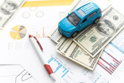 Small car model and sheets drawings Stock Photos