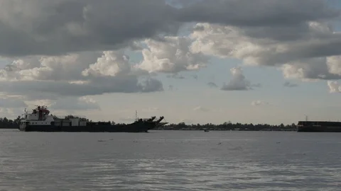 Small cargo ship sail on the river at sunset Stock Footage 107289775
