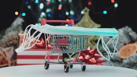 A small cart containing a pack of disposable masks is spinning on the platform, Video stock 145092632
