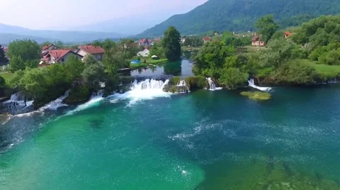 Small cascade on beautifull river 動画素材 61036703