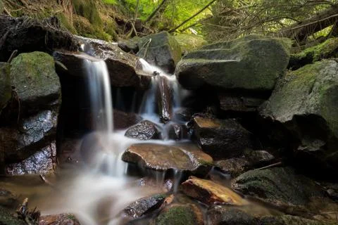 Small cascade on river Stock Photos