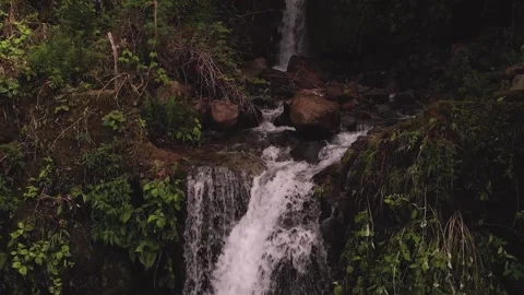 Small cascade waterfall in the middle of the rain forest. HD. Stock Footage 138716365