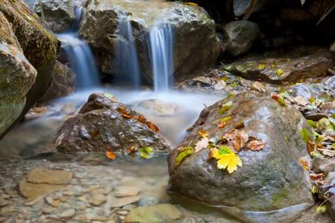 Small cascadeon mountain river Stock Photos