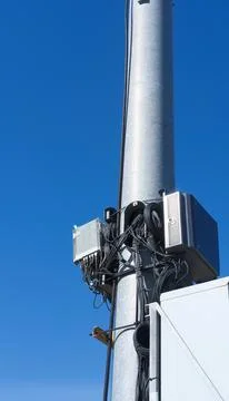 Small cell wireless installation, blue sky on background. Cellular base station Stock Photos