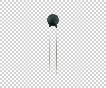 Small ceramic disc capacitor electronic component with leads isolated on tr.. Foto stock
