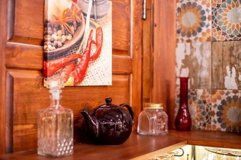 Small ceramic teapot on the shelf Stock Photos