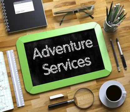 Small Chalkboard with Adventure Services Concept Stock Illustration