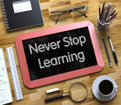 Small Chalkboard with Never Stop Learning. 3D Illustrazione stock