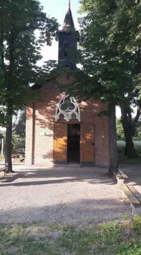 A small chapel between trees Stock Photos