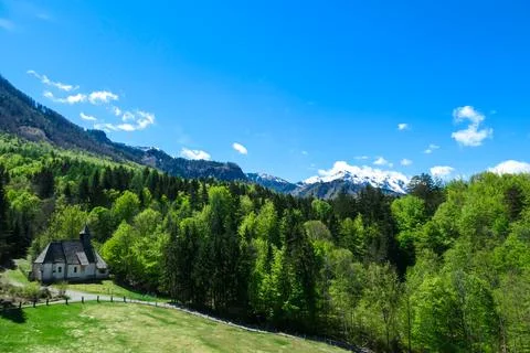A a small chapel at the edge of the forest the panoramic view on Baeren Val.. Stock Photos