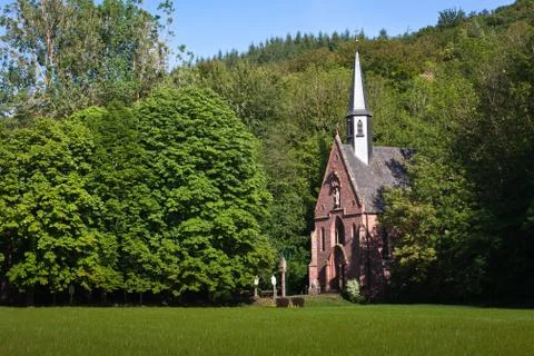 Small chapel in a forest Stock Photos