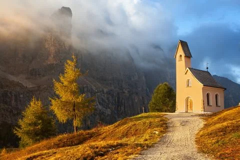 Small chapel with mountains in the background Stock Photos