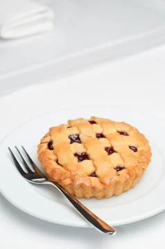 Small cherry pie Stock Photos
