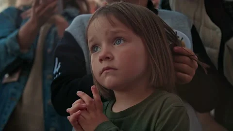 A small child boy dances in front of the stage, enjoys music at the Stereoleto Stock Footage 167365013