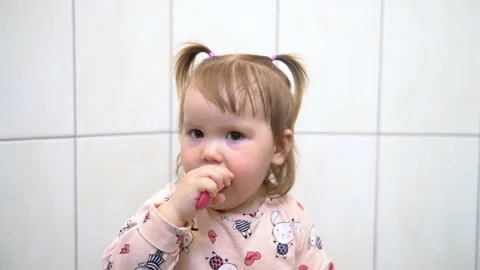 Small child brushing his teeth Stock Footage 236766401