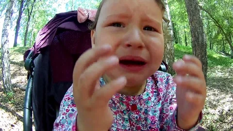 A small child cries and covers his face with his hands Stock Footage 109283044