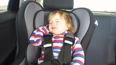 Small child cries and screams in the car. Crying baby boy in car seat. Cryi.. Stock-Footage 74622019