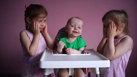 A small child eats chocolate. The kid is happy. Stock Footage 169159025