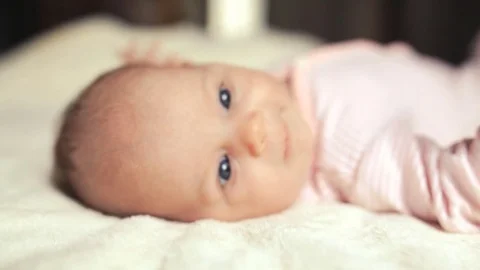 A small child laughs and screams Stock-Footage 79988319