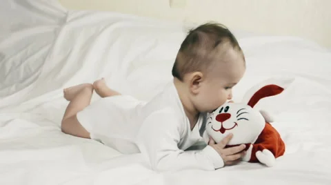 A small child playing successfully caught the rabbit, video Stock-Footage 67442752