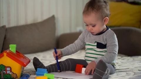 The Small Child Plays With Figures. Logical Toy Stock Footage 76132269