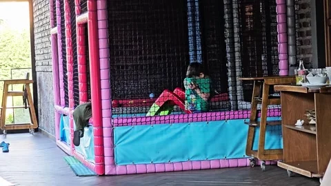 A small child sitting in. Stock Footage 282661988